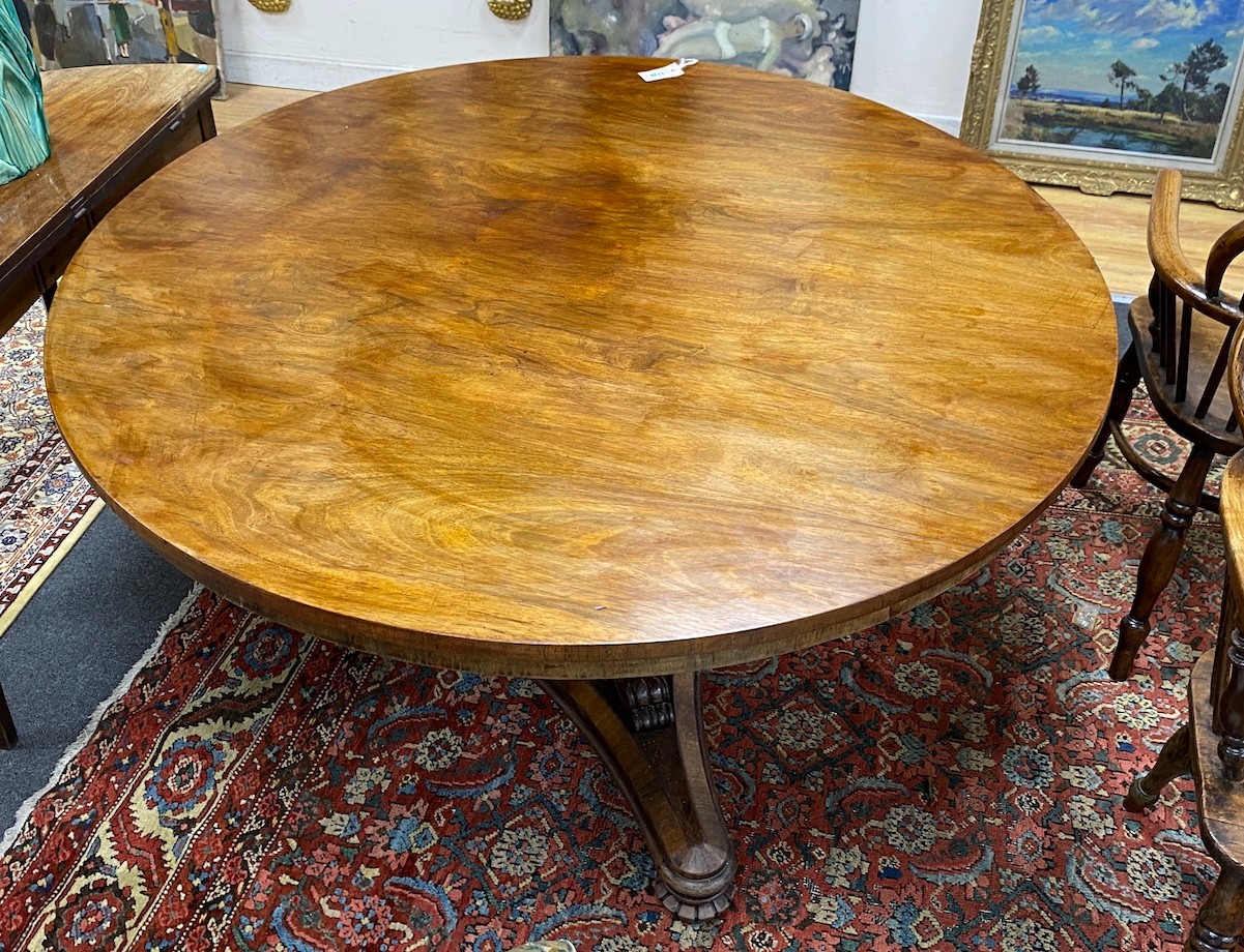 A William IV circular rosewood tilt top breakfast table, diameter 135cm, height 72cm